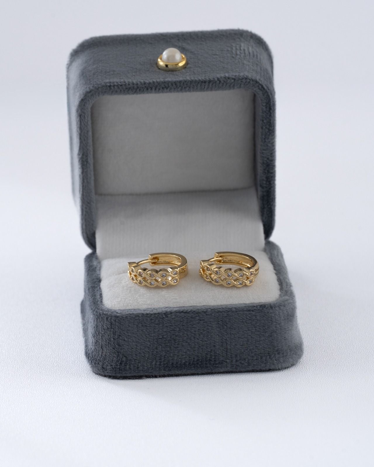 Aretes candonga Interlace